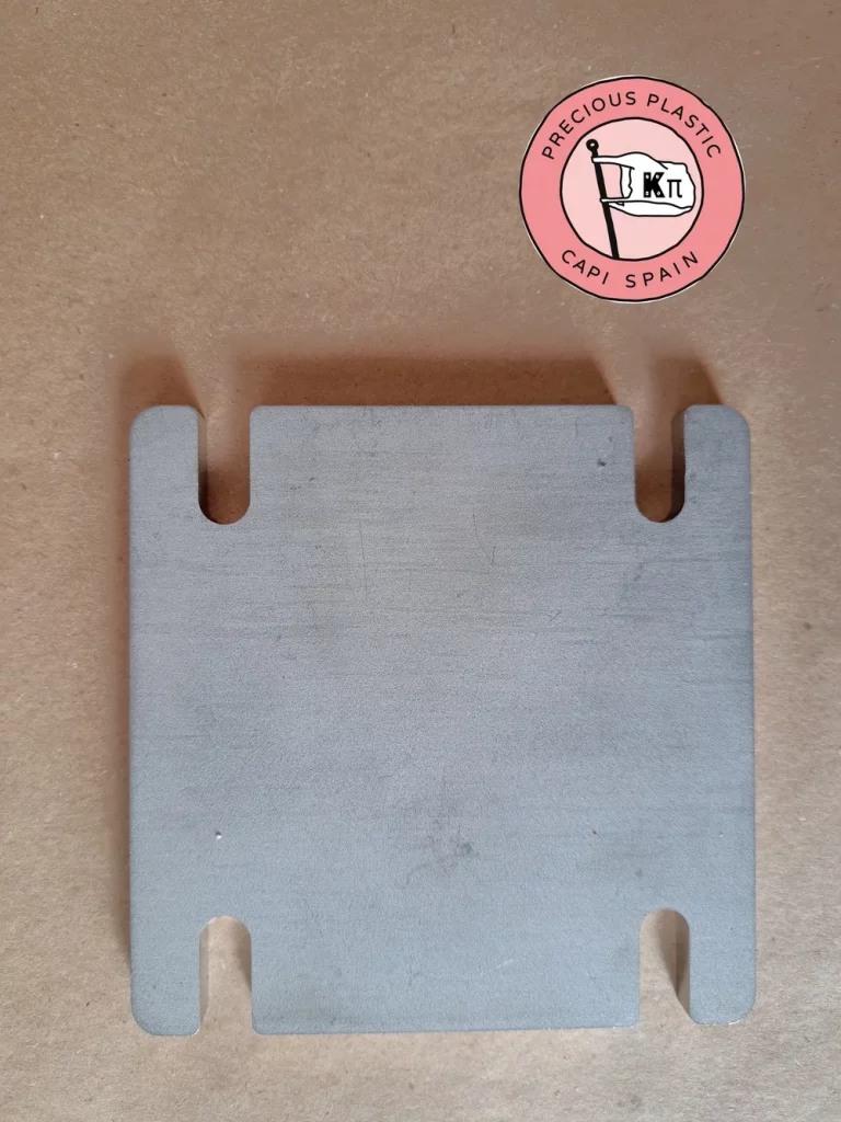 Stainless steel mini injection mould base plate, from Precious Plastic Capi Spain's Mini Injection Moulds Series.