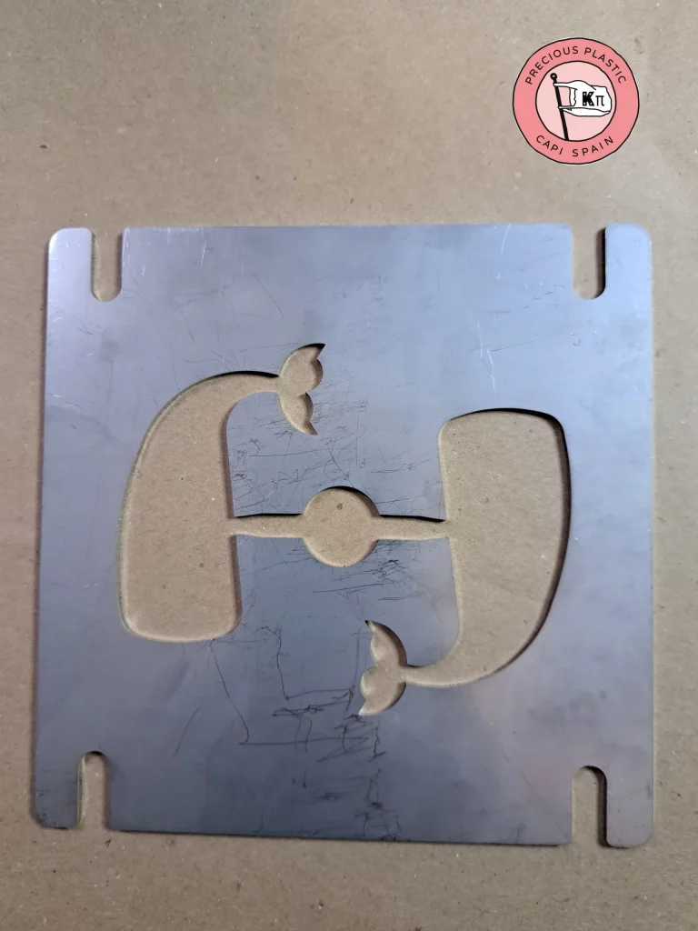 Stainless‑steel injection mould plate featuring two whales, part of the Marine World Collection by Precious Plastic Capi Spain.