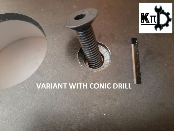 Close-up detail of the conic drill countersunk hole and flush screw on the steel plate of the Precious Plastic shredder.