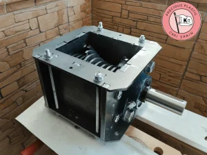 Reinforced V3.3 shredder box by Precious Plastic fully assembled featuring knives, heavy-duty bolts, and keyway shaft.